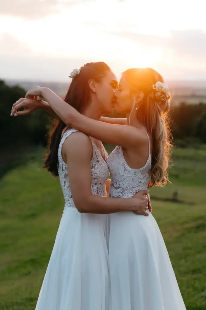lesbian wedding couple kissing