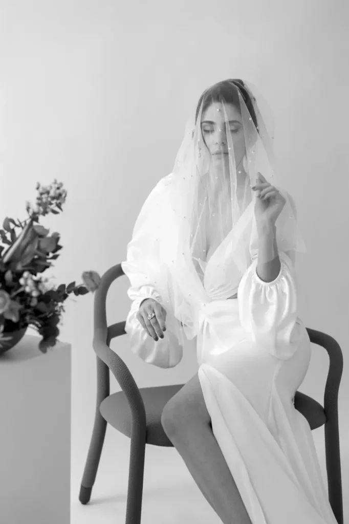 bride on her wedding day in mallorca with her veil and wedding dress in finca